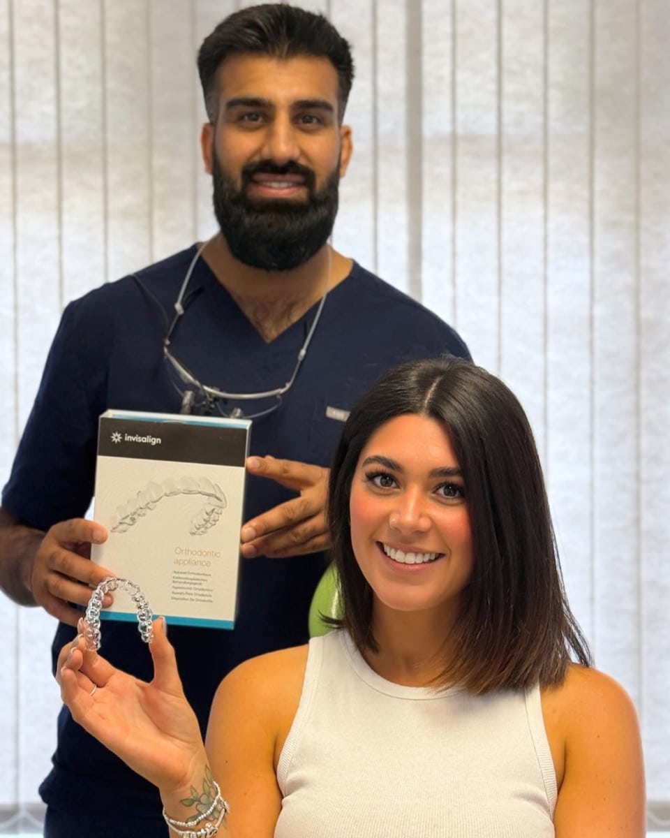 Invisalign patient smiling with her dentist at The Tooth Spa, Chapel Allerton, Leeds