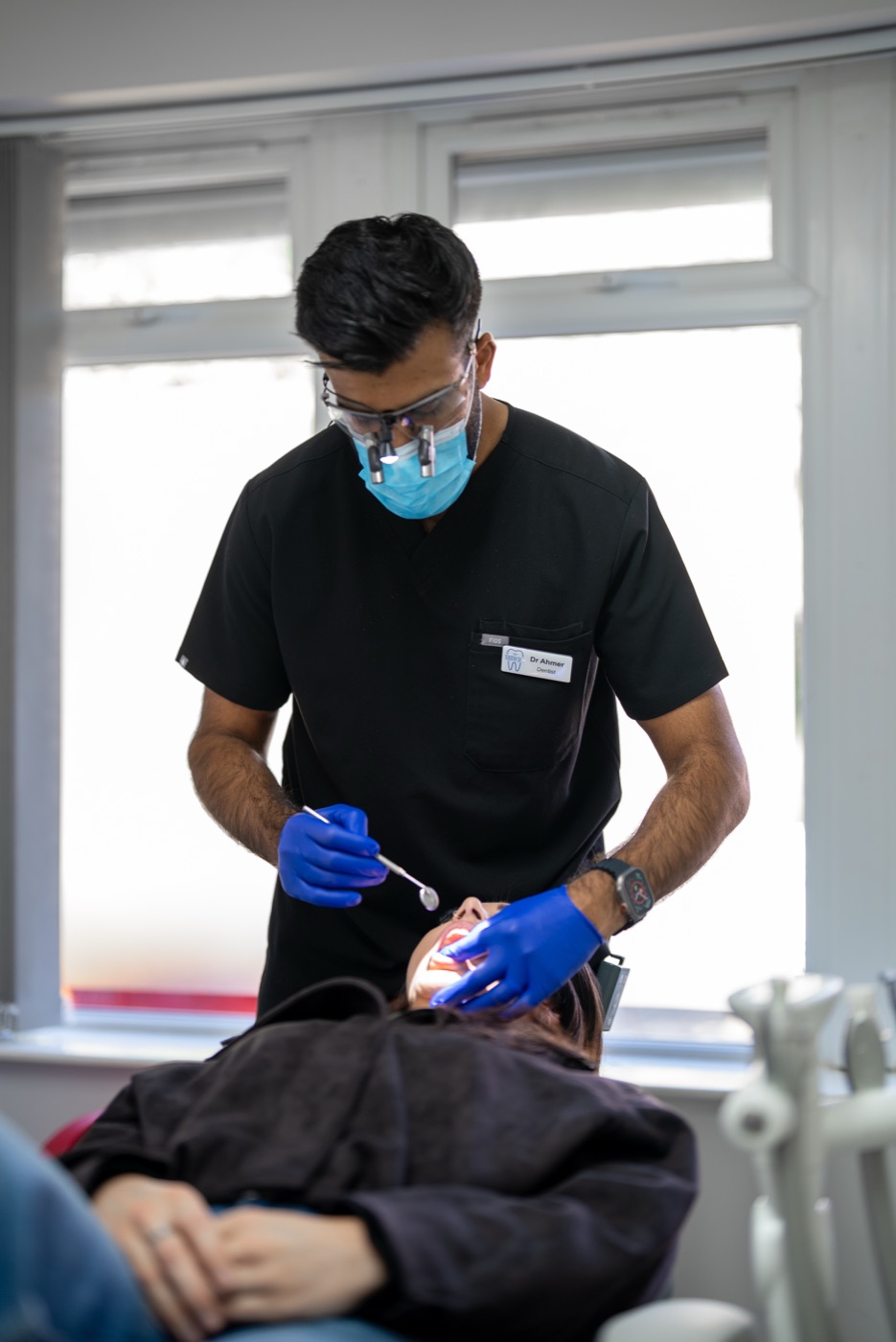 Dr Ahmer Imtiaz treating a patient at our emergency dental practice in Leeds
